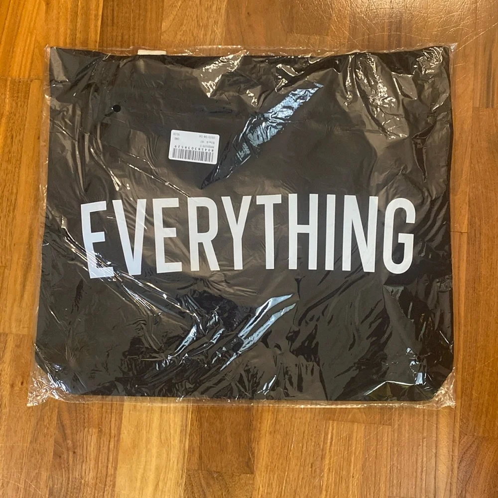 Black with cream handle everything tote bag